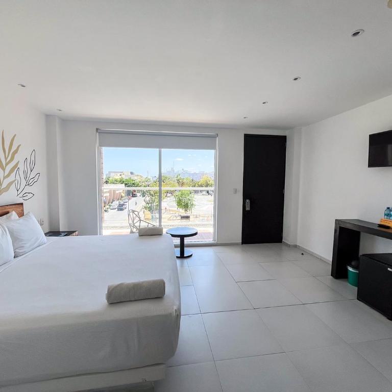 Cache Hotel Boutique - Adults Only - Habitación con cama extragrande. - 10