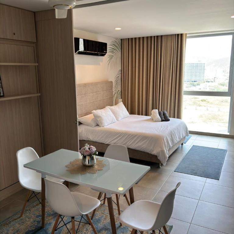 Hermoso y moderno Loft con Piscinas, vista al Mar y cerca de la Playa - Apartamento Loft de 1 dormitorio - 10