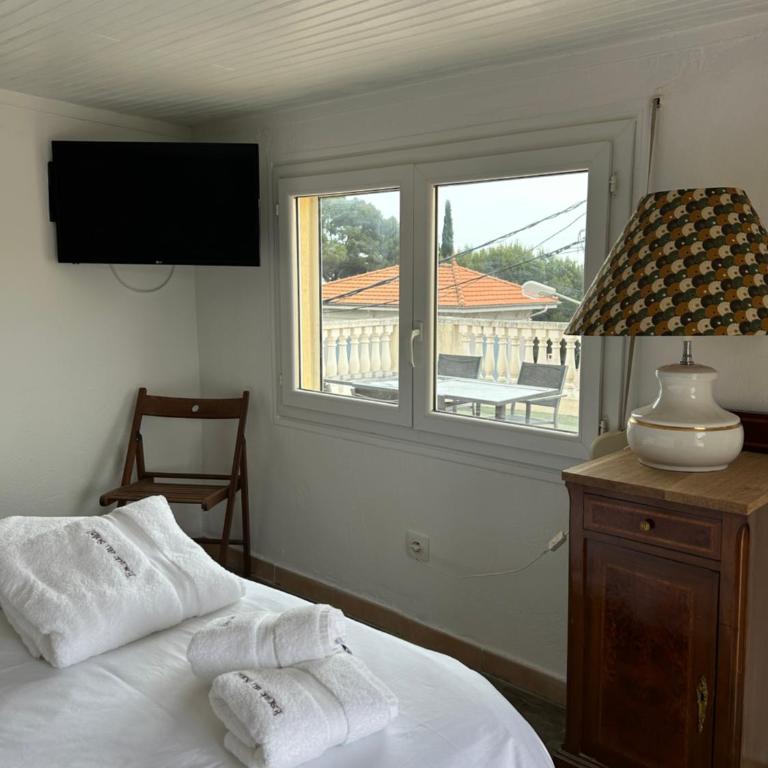 Hôtel L'Escale Au Soleil - Chambre Lit Queen-Size - Vue sur Mer - 13