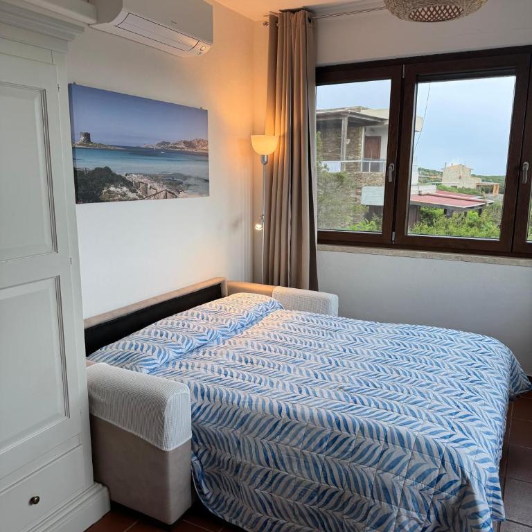 Casa con giardino, Wi-Fi e aria condizionata vicino alla Pelosa - Appartamento con 2 Camere da Letto e Vista Mare - 28