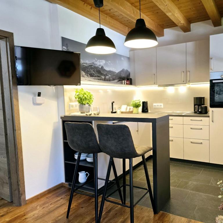 Ferienwohnungen Alpspitzecho - Apartment mit Balkon - 10