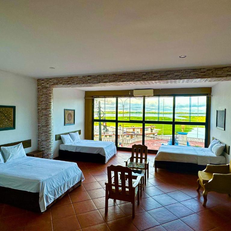 La Posada del Cauchero Hotel & Suites - Triple Room with View - 1