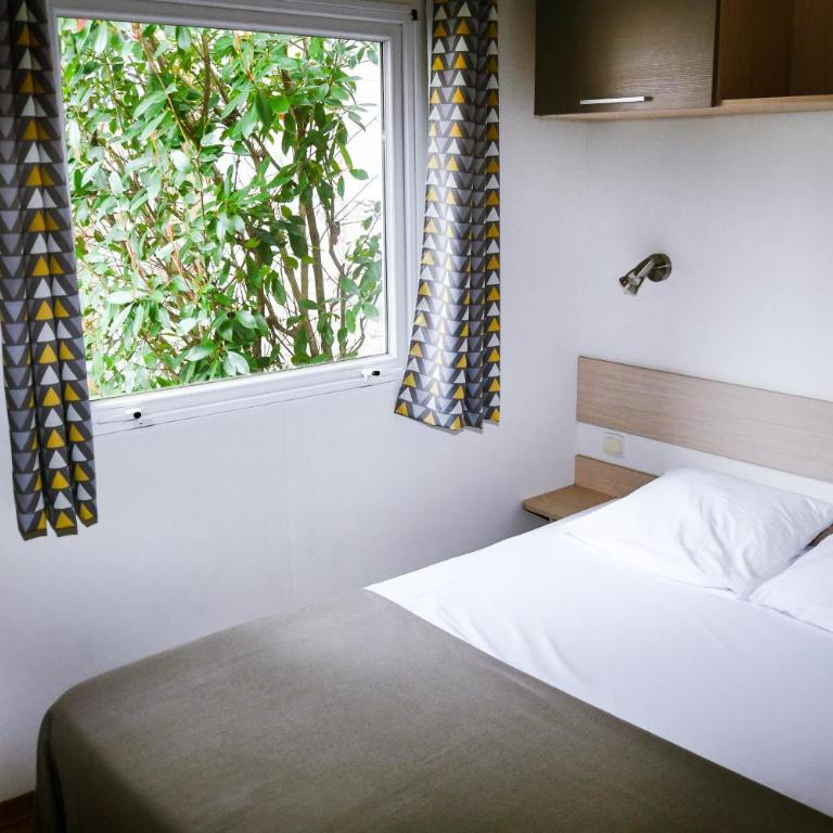Camping Les Amandiers - Bungalow 2 Chambres - 5