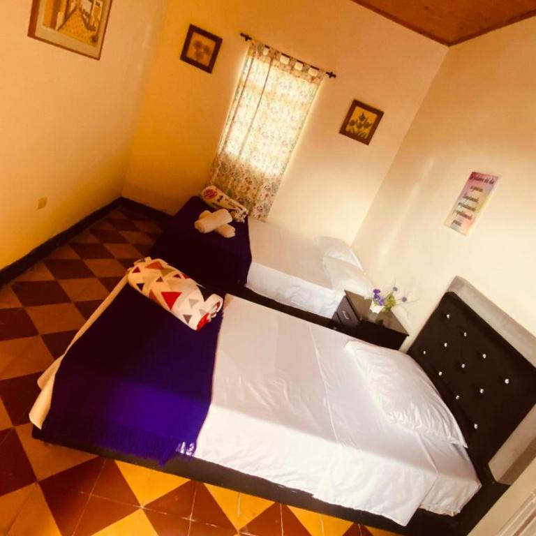 Hospedaje Campestre Araucarias - Habitación Triple con vistas al jardín - 3