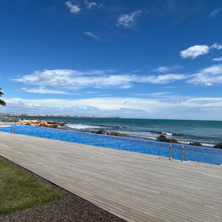 LUXURY POSIDONIA Punta Prima - Apartamento de 2 dormitorios con vistas al mar - 9