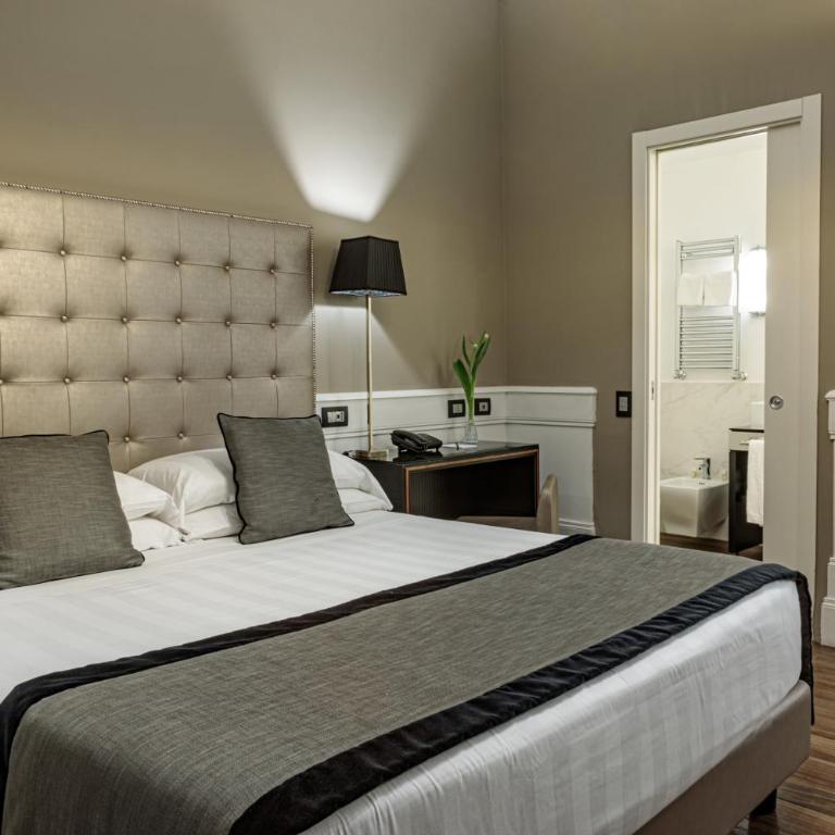 The Independent Suites - Camera Tripla Deluxe - 1