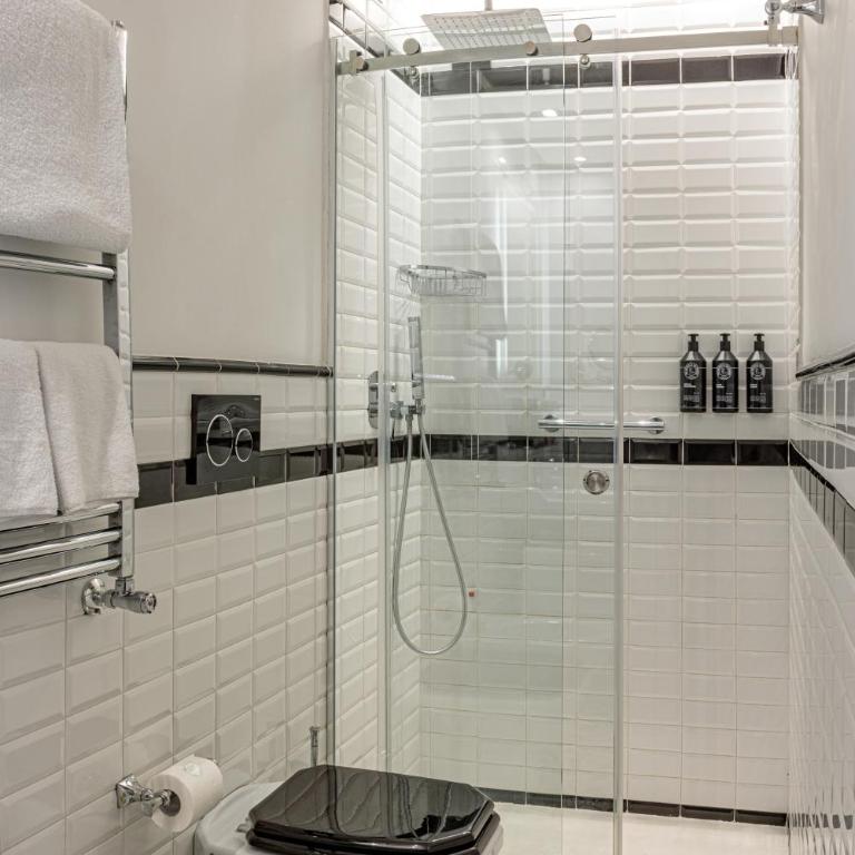 The Independent Suites - Camera Tripla Deluxe - 8
