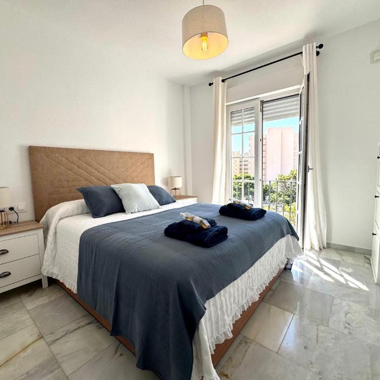Terraza y vistas en Carihuela Erisa 2 a 100 metros de la playa - Apartamento de 2 dormitorios - 23