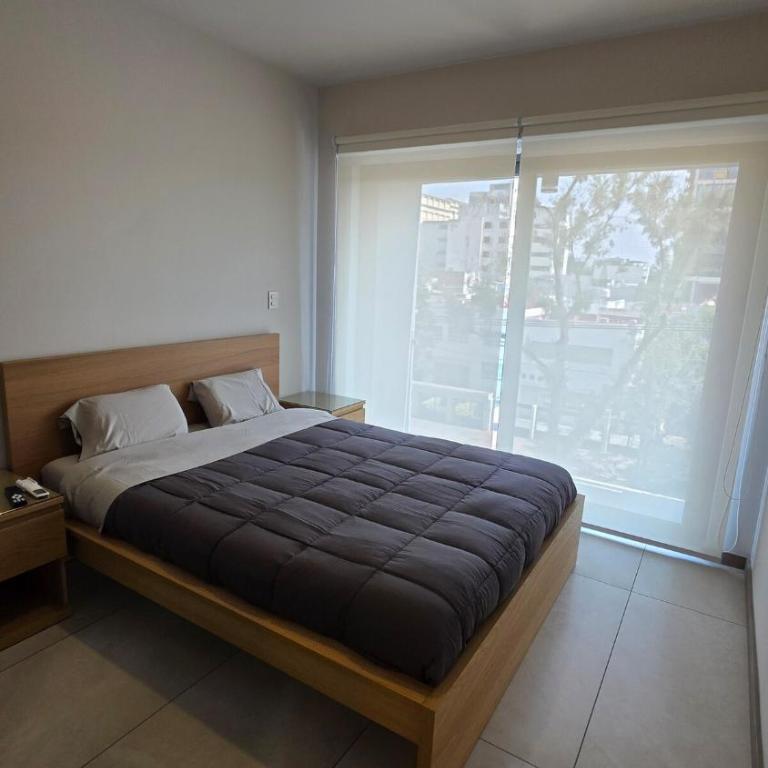 Departamento con alberca Minerva - Apartamento de 2 dormitorios - 4