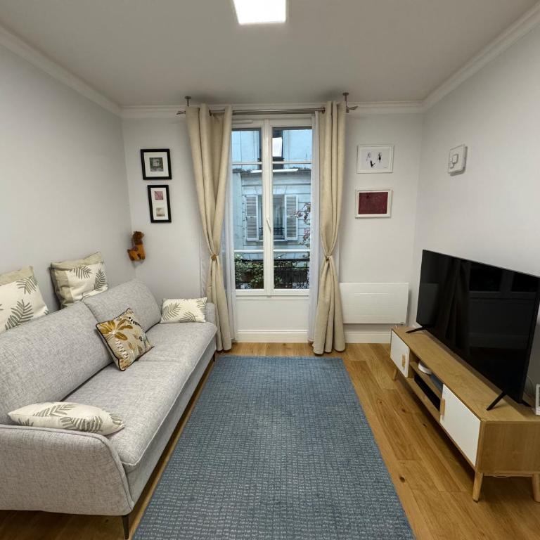 Au coeur du marché Poncelet et à 2 pas de l'Arc de Triomphe - appartement 6 personnes et 1 bébé, sdb, 2 WC - Appartement 2 Chambres - 12