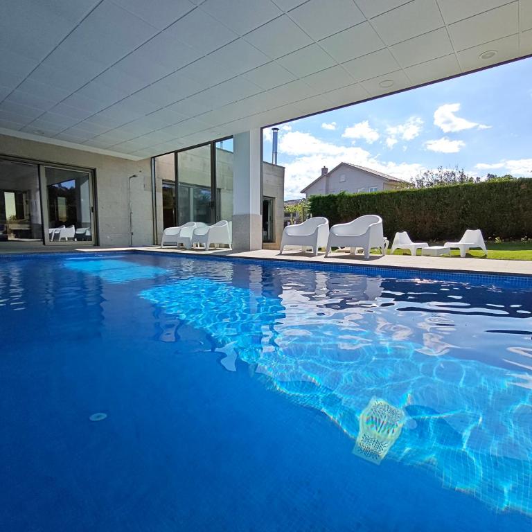 Sanxenxo Casa Rial 47 con PISCINA CLIMATIZADA - Casa - 1
