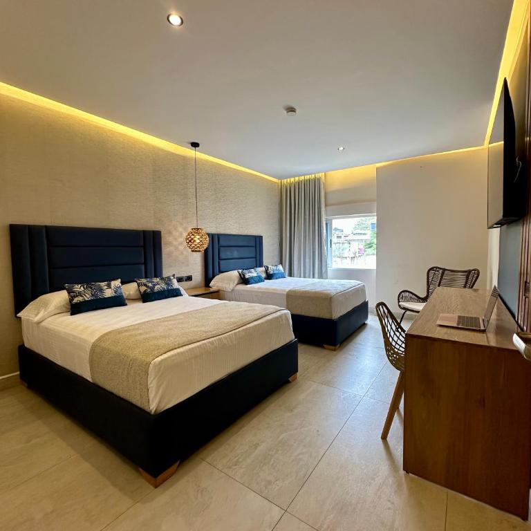 Hotel y Cabañas Covemar - Habitación Doble - 2 camas dobles - 2