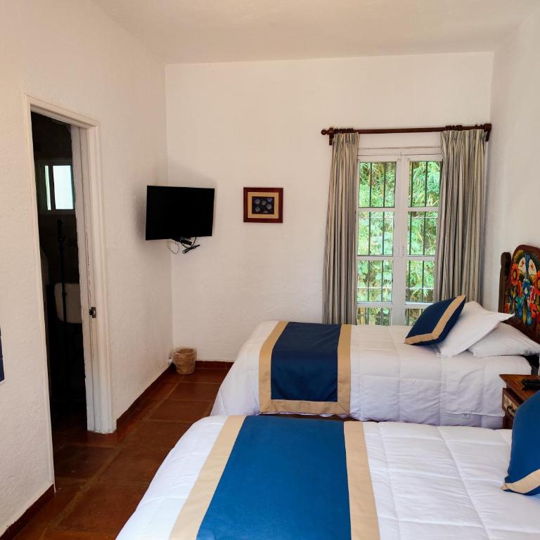 Casa de las Conchas Cuernavaca - Habitación Doble con vistas al jardín - 1 o 2 camas - 12