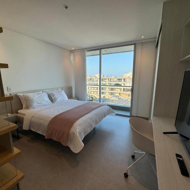 Hermosa y Comoda Suite en Distrito 90 - Apartamento de 1 dormitorio con vistas - 12