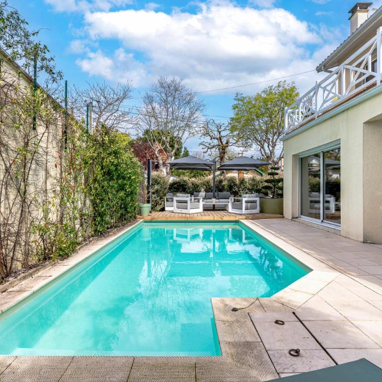 Villa Fleurs des Pins, piscine chauffée , 80 m de la plage Pereire - Villa - 4