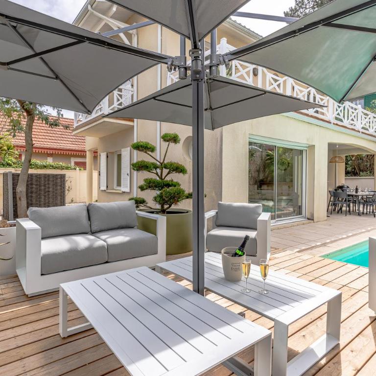 Villa Fleurs des Pins, piscine chauffée , 80 m de la plage Pereire - Villa - 17
