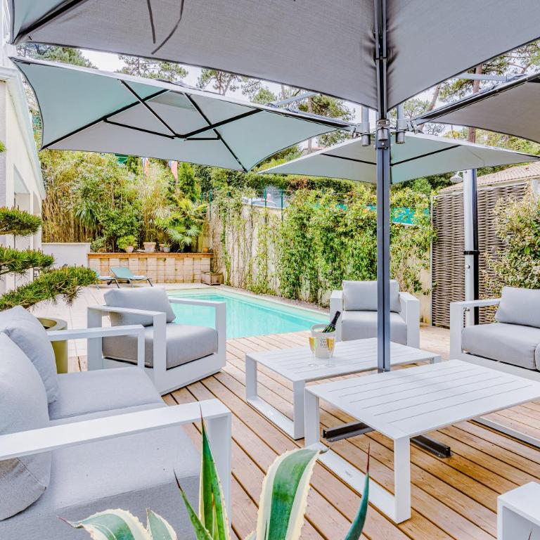 Villa Fleurs des Pins, piscine chauffée , 80 m de la plage Pereire - Villa - 18