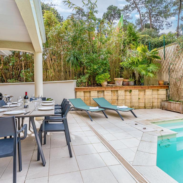 Villa Fleurs des Pins, piscine chauffée , 80 m de la plage Pereire - Villa - 28