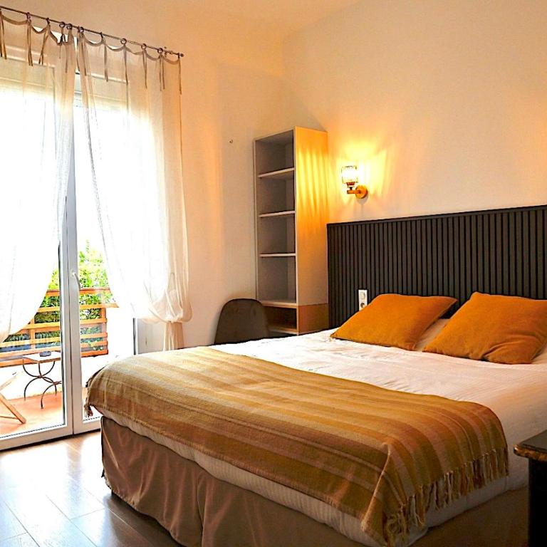 Hôtel La Petite Bohème - Chambre Lit Queen-Size Deluxe - 1