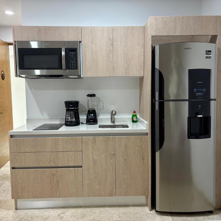 Modern Refuge Just Steps from 5th Avenue - Two-Bedroom Apartment with Balcony and Sea View - 6