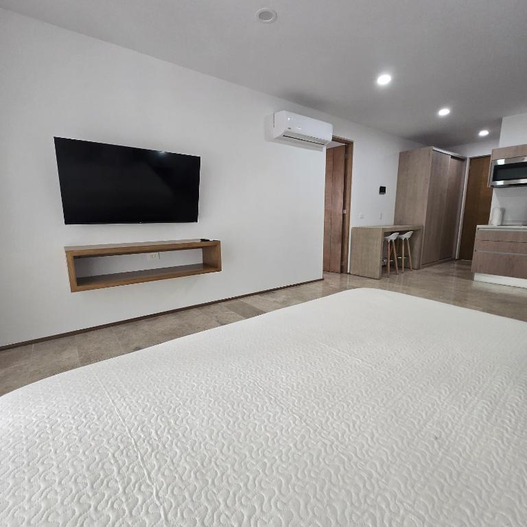 Modern Refuge Just Steps from 5th Avenue - Two-Bedroom Apartment with Balcony and Sea View - 11