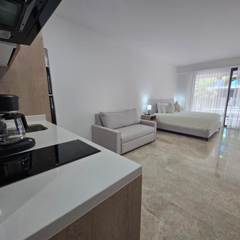 Modern Refuge Just Steps from 5th Avenue - Two-Bedroom Apartment with Balcony and Sea View - 7