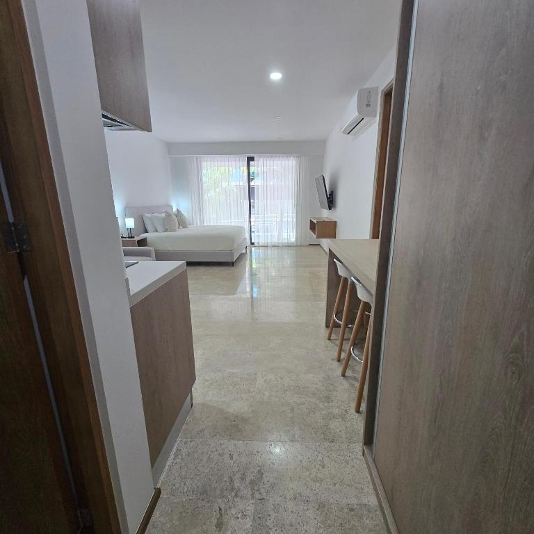 Modern Refuge Just Steps from 5th Avenue - Two-Bedroom Apartment with Balcony and Sea View - 8