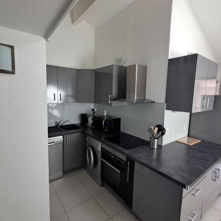 Maison fleurs des sables - Two-Bedroom Apartment - 13