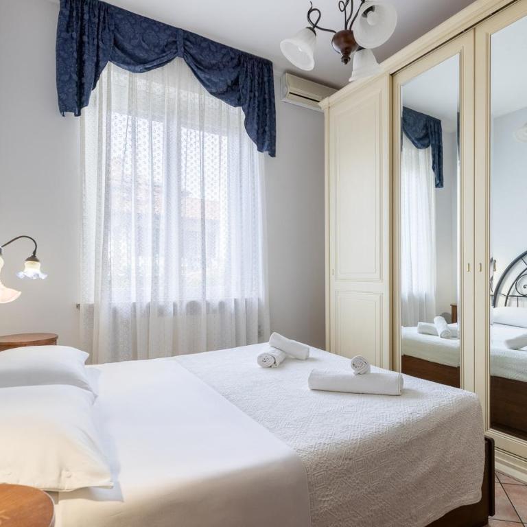 Appartamento con Giardino a 5 Minuti dal Centro Storico - Parcheggio Privato e Gratuito, Wi-Fi & AC - Appartamento con 2 Camere da Letto - 5