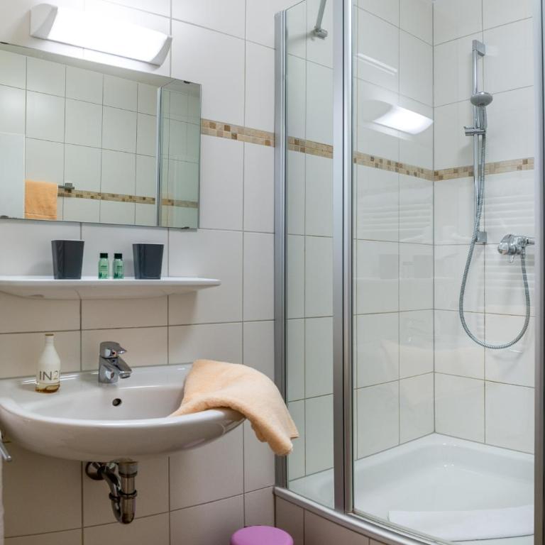 Werdenfelser Hof - Doppelzimmer mit Stadtblick - 11