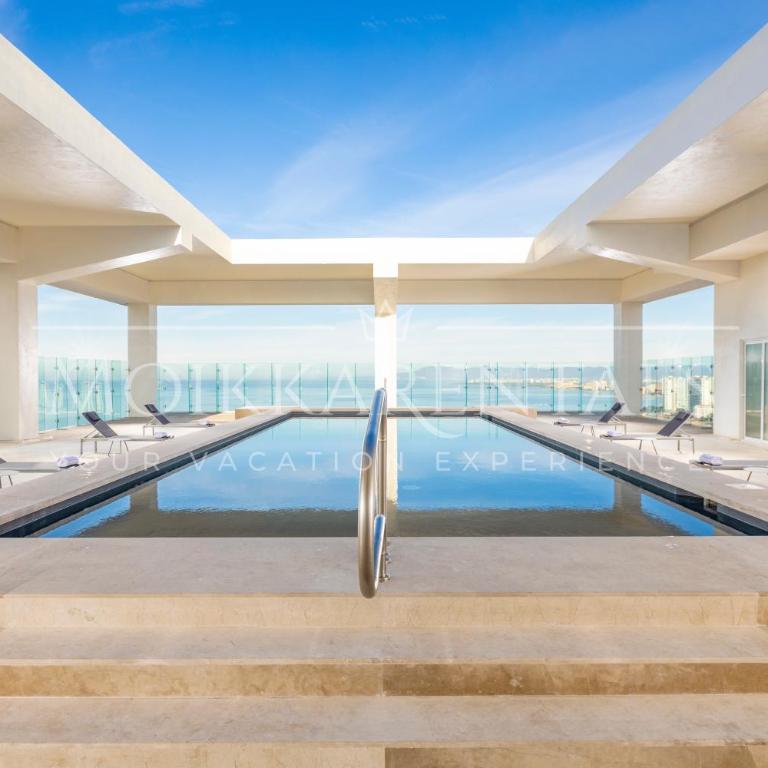 Designer 1BR Beachfront Retreat – Wake Up to the Waves - One-Bedroom Apartment - 54