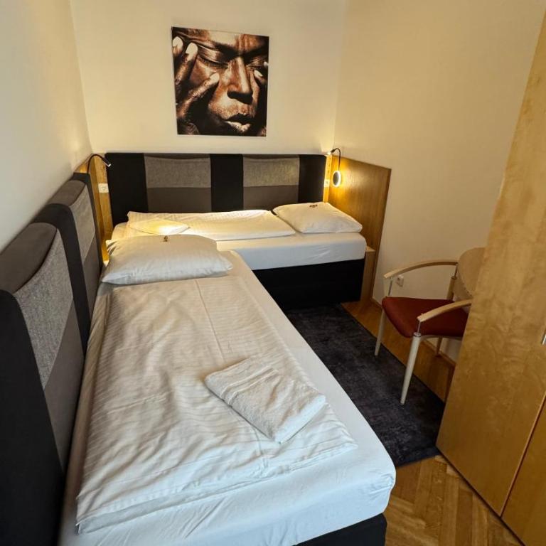 Guesthouse Mozart - Apartment House - Familienzimmer mit Dusche - 7