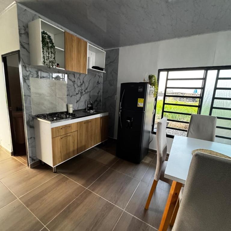 Casa con Parrilla y Espacios al Aire Libre - Casa de 3 dormitorios - 15