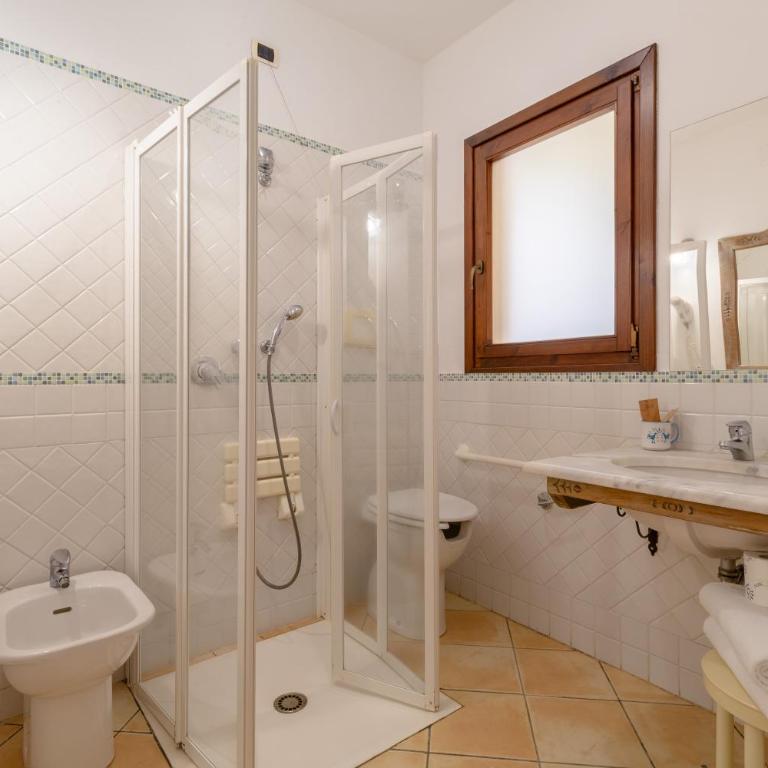 Porto Giunco Residence - Monolocale con Accesso Disabili - 10