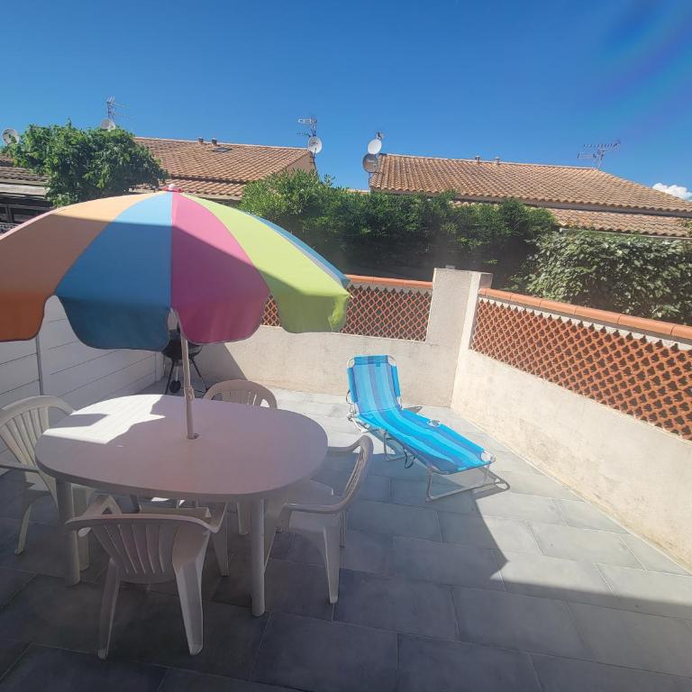 Maison T2 cabine 4 couchages, terrasse cloturée, résidence Sun village avec piscine commune, 300m de la plage à PORTIRAGNES PLAGE LRSUNR6 - Casa con 2 Camere da Letto - 9