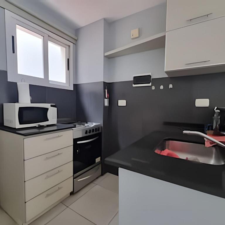 Moderno departamento con patio privado - Apartamento - 11