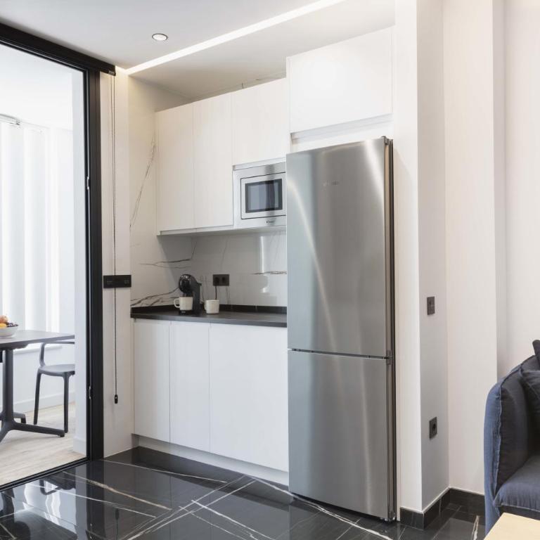 Un acogedor complejo compuesto de 5 apartamentos . - Apartamento con balcón - 5
