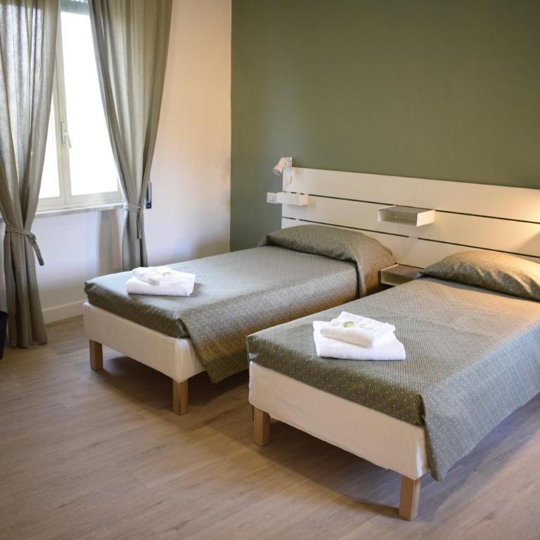 Residenza Cimone - Camera Doppia con Letti Singoli - 1