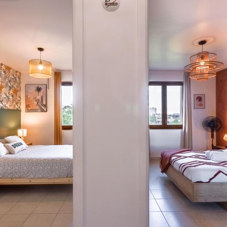 LE PETIT SÉSAME appartement 70m2 avec terrasse et jacuzzi cosy idéal groupe, capacité 6 personnes , 2 chambres,canapé lit, proche Stade De France, Wifi Parking privé très bon rapport qualité prix - Two-Bedroom Apartment - 6