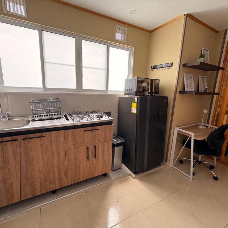 Refugio entre arboles, apartaestudio cerca a holguines, y el club campestre - One-Bedroom Apartment - 14