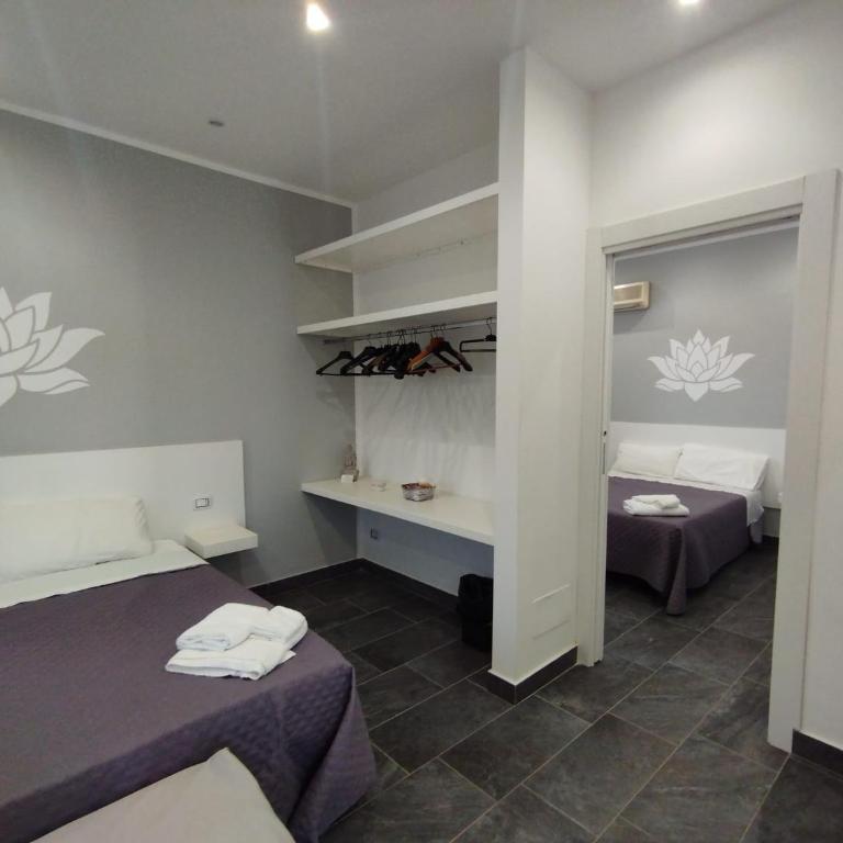 Fiore di Loto Rooms - Camera Quadrupla con Balcone - 24