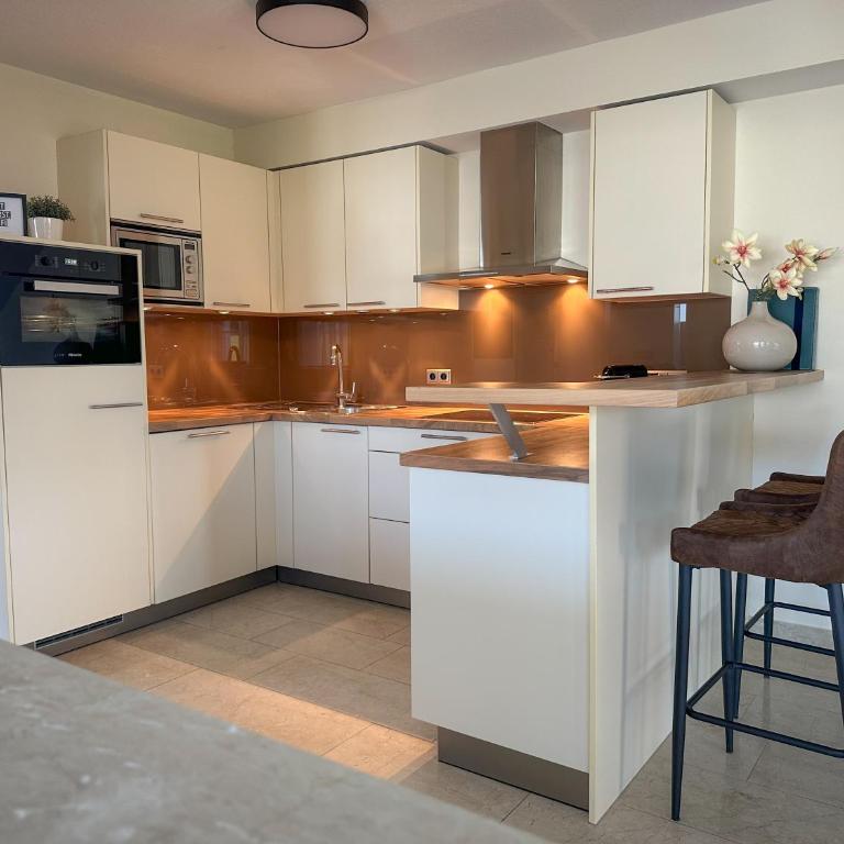"GLÜCKSMOMENT" - Premium Apartments Seekirchen, beeindruckende Ferienwohnung mit gemeinsam genutzter Poolarea - Apartment - 60