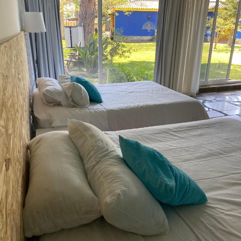Jacaranda - Habitación con cama grande y vistas al jardín - 15