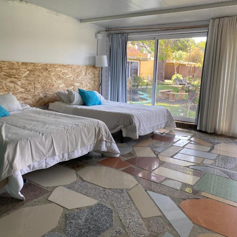 Jacaranda - Habitación con cama grande y vistas al jardín - 17