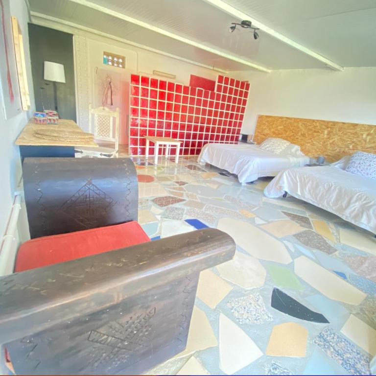 Jacaranda - Habitación con cama extragrande y vistas al jardín - 1