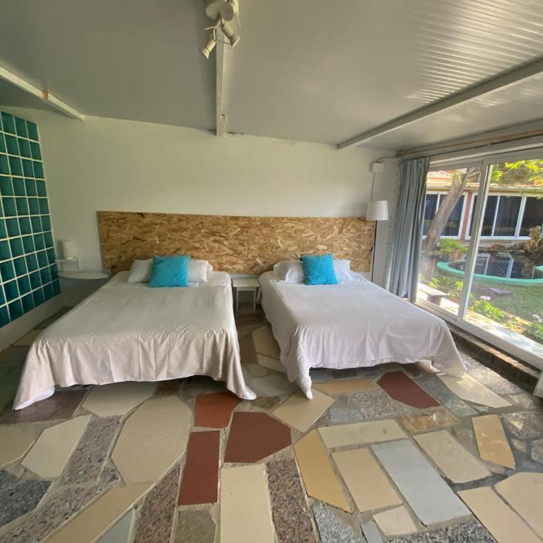 Jacaranda - Habitación con cama grande y vistas al jardín - 24