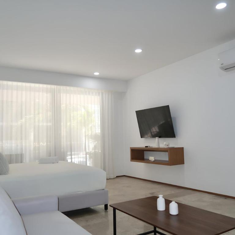 Modern Refuge Just Steps from 5th Avenue - Two-Bedroom Apartment with Balcony and Sea View - 28