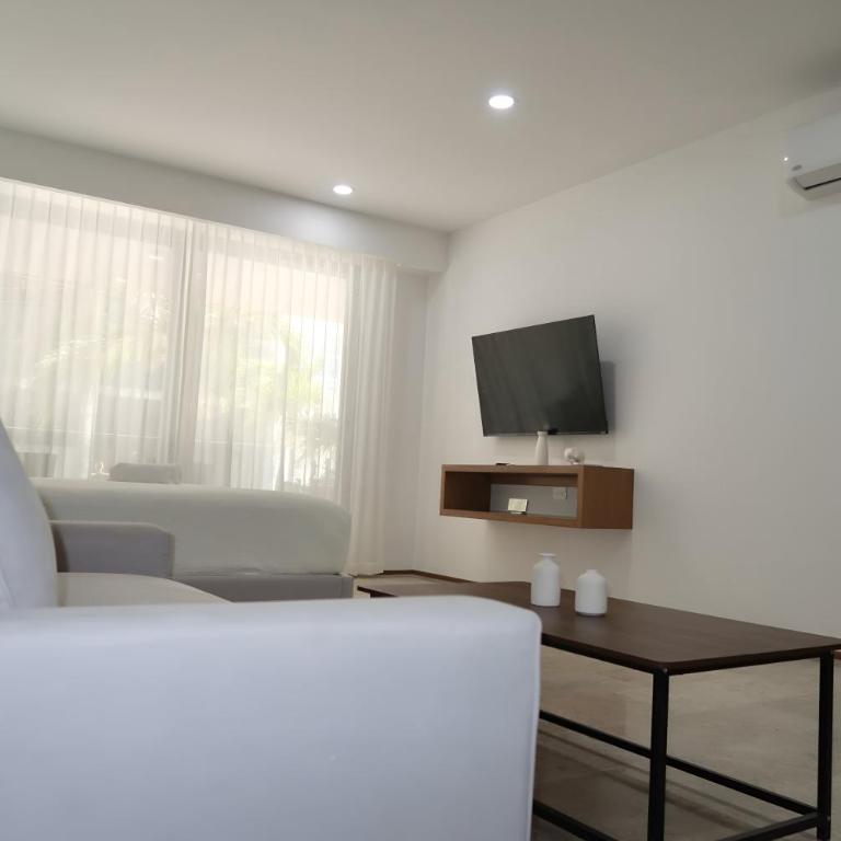 Modern Refuge Just Steps from 5th Avenue - Two-Bedroom Apartment with Balcony and Sea View - 30