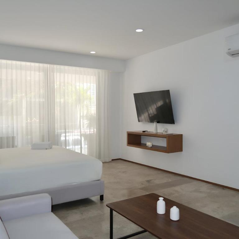 Modern Refuge Just Steps from 5th Avenue - Two-Bedroom Apartment with Balcony and Sea View - 32