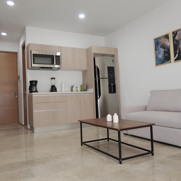 Modern Refuge Just Steps from 5th Avenue - Two-Bedroom Apartment with Balcony and Sea View - 33